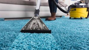 person-using-an-at-home-carpet-cleaner.jpg